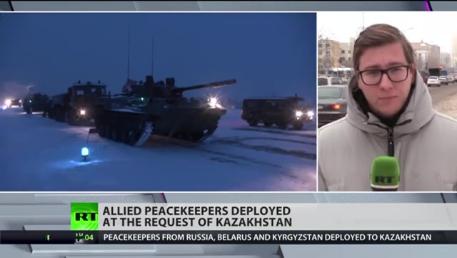 Сюжет новостного телеканала RT (RT English) о миротворческой операции ОДКБ на территории Республики Казахстан